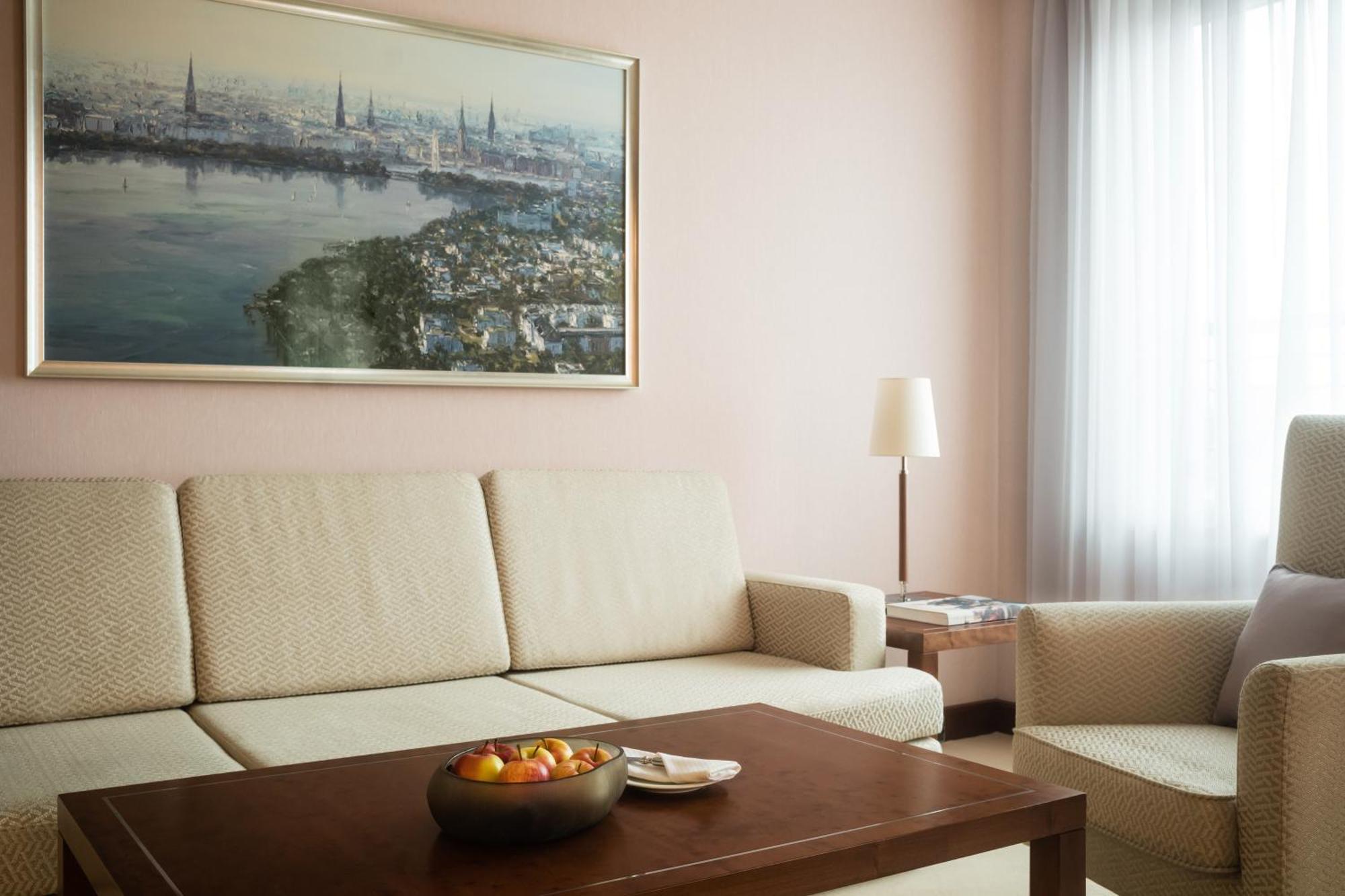 GRAND ELYSEE Hamburg Bagian luar foto A 3D rendering of a living room